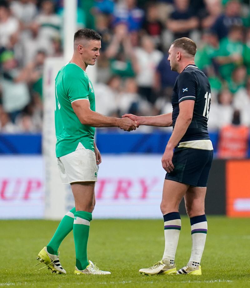Ireland's Johnny Sexton and Scotland's Finn Russell shake hands after the Rugby World Cup match. Photograph: Andrew Matthews/PA
