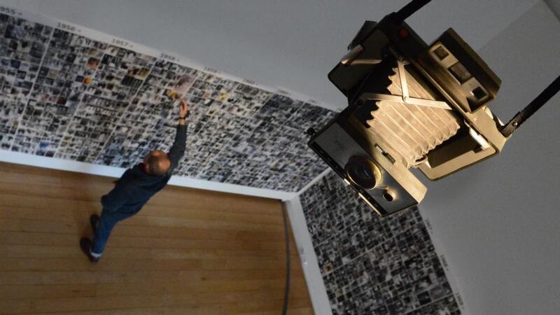 A camera owned by Arthur Fields hangs at the Gallery of Photography as part of the exhibition ‘Man on the Bridge’. Photograph: Cyril Byrne/The Irish Times