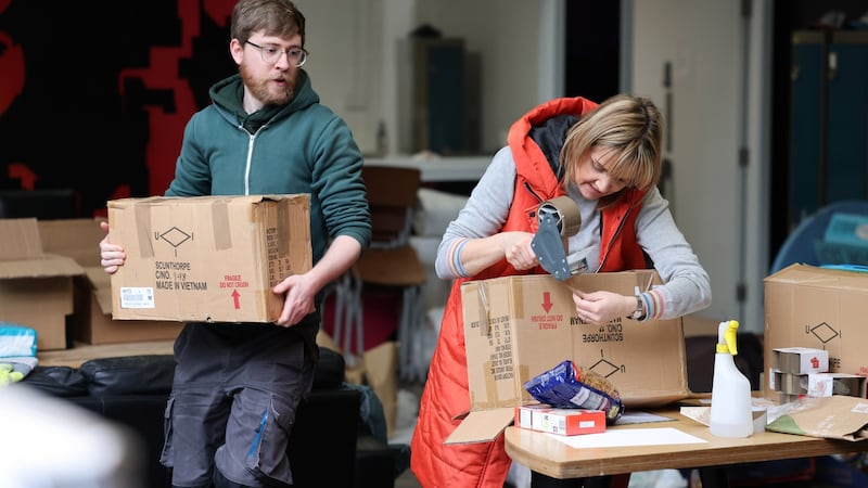Daragh Merrigan of Rascals Brewery in Inchicore with volunteer Lynn Moran ready donations of goods for the people of Ukraine. Photograph: Dara Mac Dónaill
