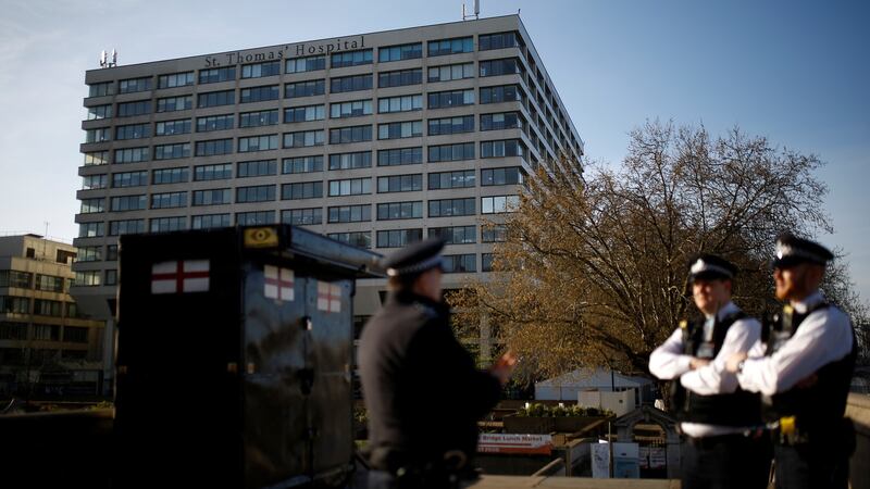 Police officers outside St Thomas’ Hospital in London where British prime minister Boris Johnson was moved to intensive care while his coronavirus symptoms worsened. Photograph: Henry Nicholls/Reuters