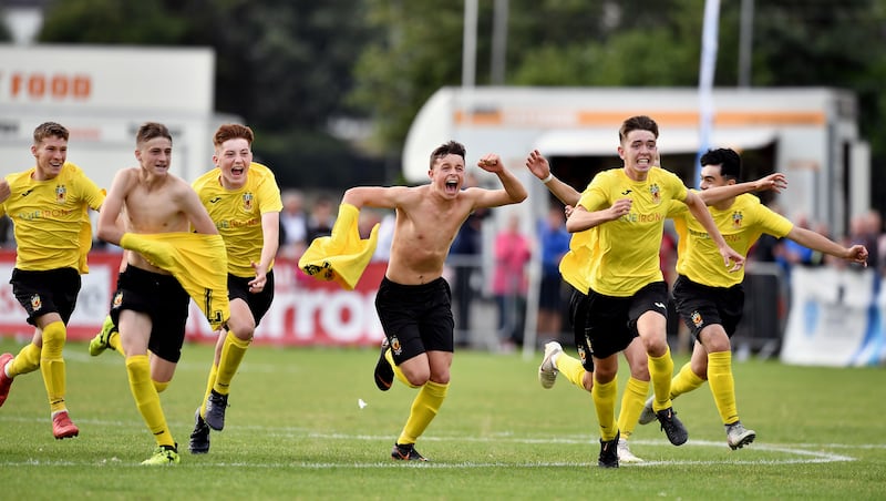 The Co Antrim team celebrate winning a penalty shootout against Manchester United in the 2018 SuperCupNI final at Ballymena Showgrounds. Photograph: Charles McQuillan/Getty Images