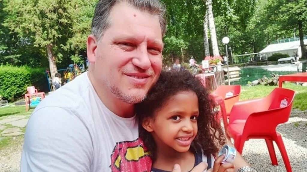 Robert Pether with his daughter, eight-year-old Nala.