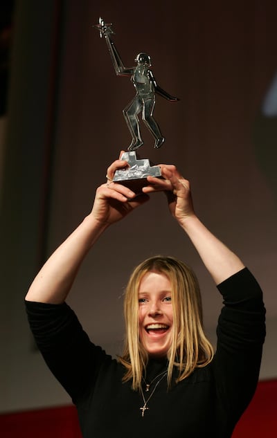Jockey Cathy Gannon celebrates becoming the first recipient of The Irish Times Sportswoman of the Year Award, in 2004. Photograph: Frank Miller