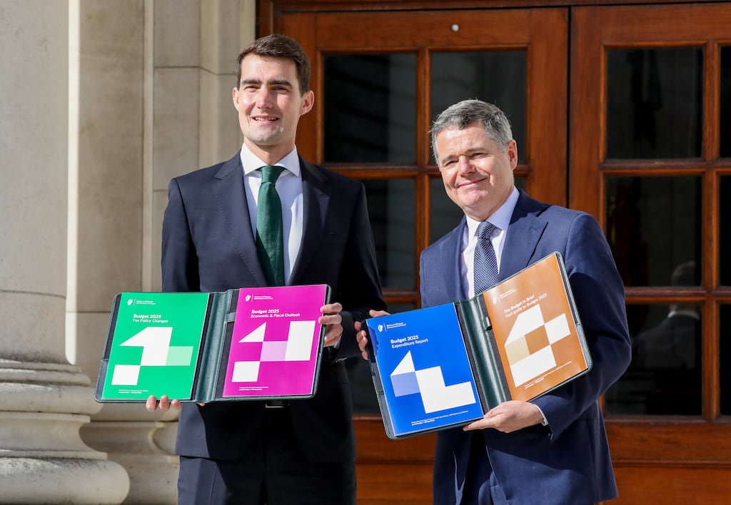 Minister for Finance Jack Chambers and Minister for Public Expenditure and Reform Paschal Donohoe with their documents before presenting Budget 2025. Photograph: Paul Faith/AFP via Getty Images