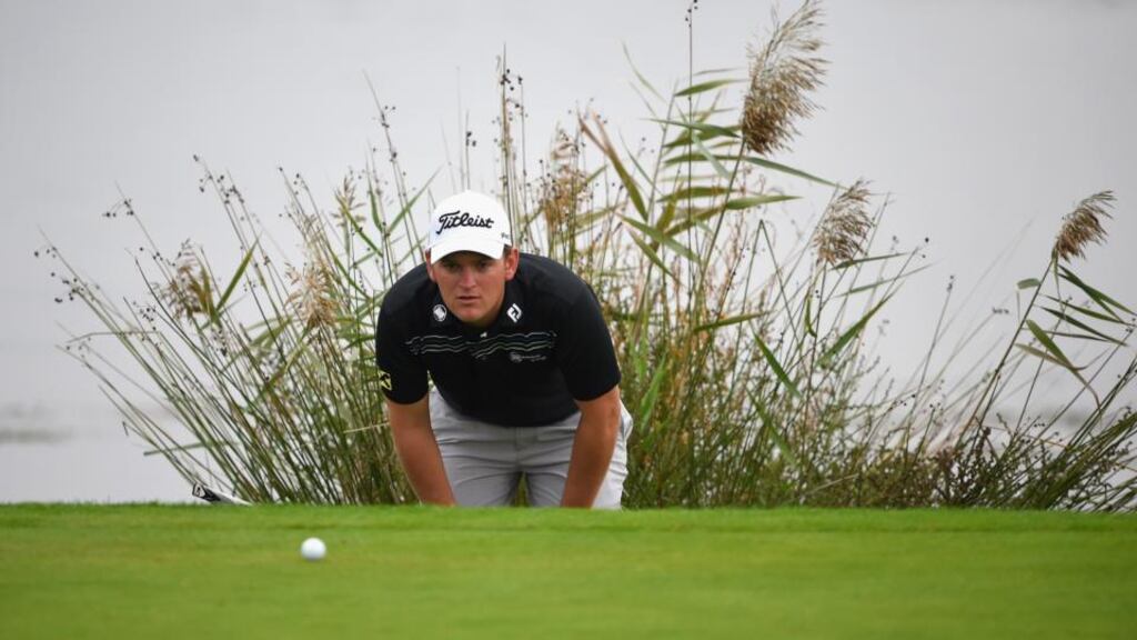 Bernd Wiesberger of Austria lines up a putt during the third day of the Portugal Masters. Photograph: Stuart Franklin/Getty Images