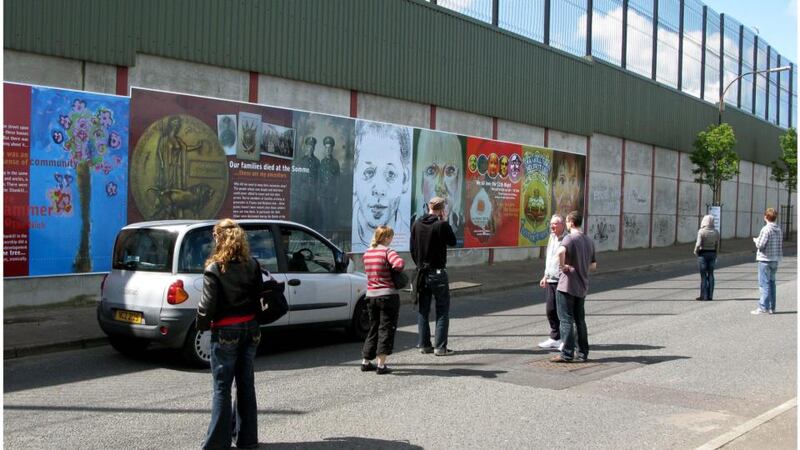 Tourists at the wall on Cupar Street, off Shankill Road. Photograph: David Sleator
