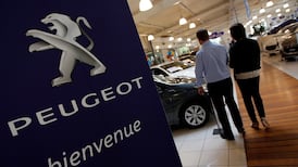 Peugeot posts record earnings despite sales dip