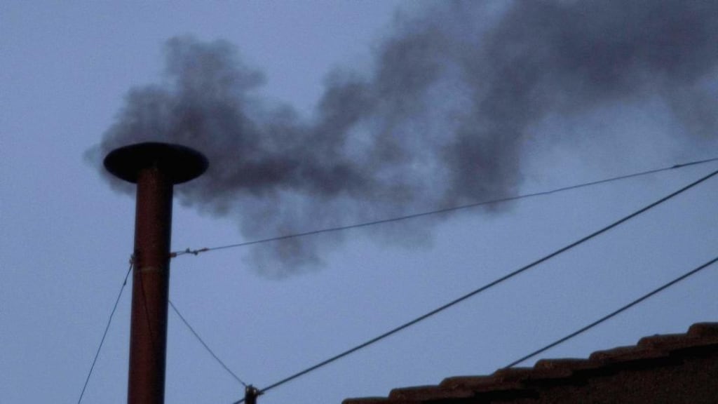 Black smoke is seen rising from the roof of the Sistine Chapel indicating that the College of Cardinals have failed to elect a new Pope on April 18th, 2005 in Vatican City. Photograph: Peter Macdiarmid/Getty Images