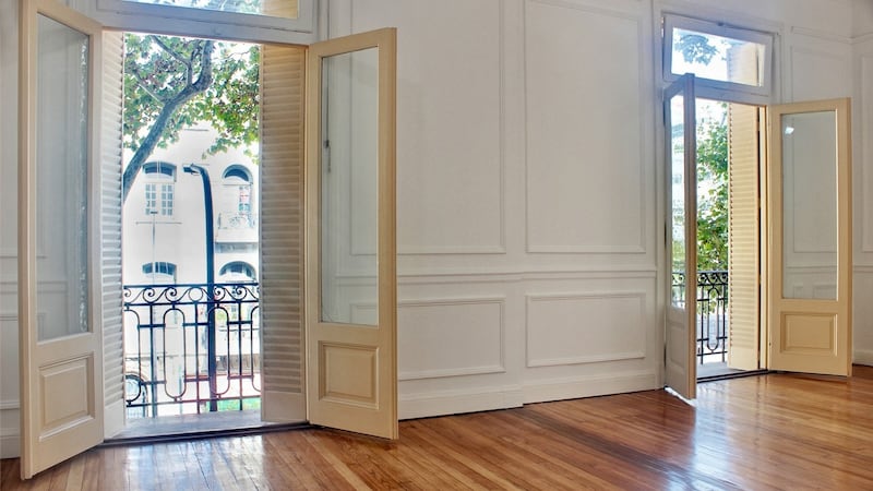 This Buenos Aires property boasts original wooden flooring with panelled walls and balconies overlooking the street