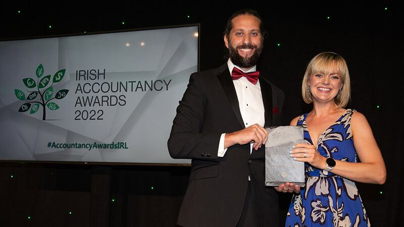Ayman Kaouri, head of EMEA Hub, XERO, presents the Small Practice of the Year award to Fiona Hickey, FAH Chartered Accountants.