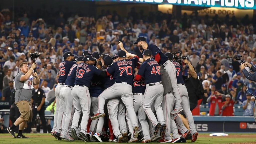 The Boston Red Sox celebrate their 5-1 win over the LA Dodgers in game five. Photograph: Sean M. Haffey/Getty