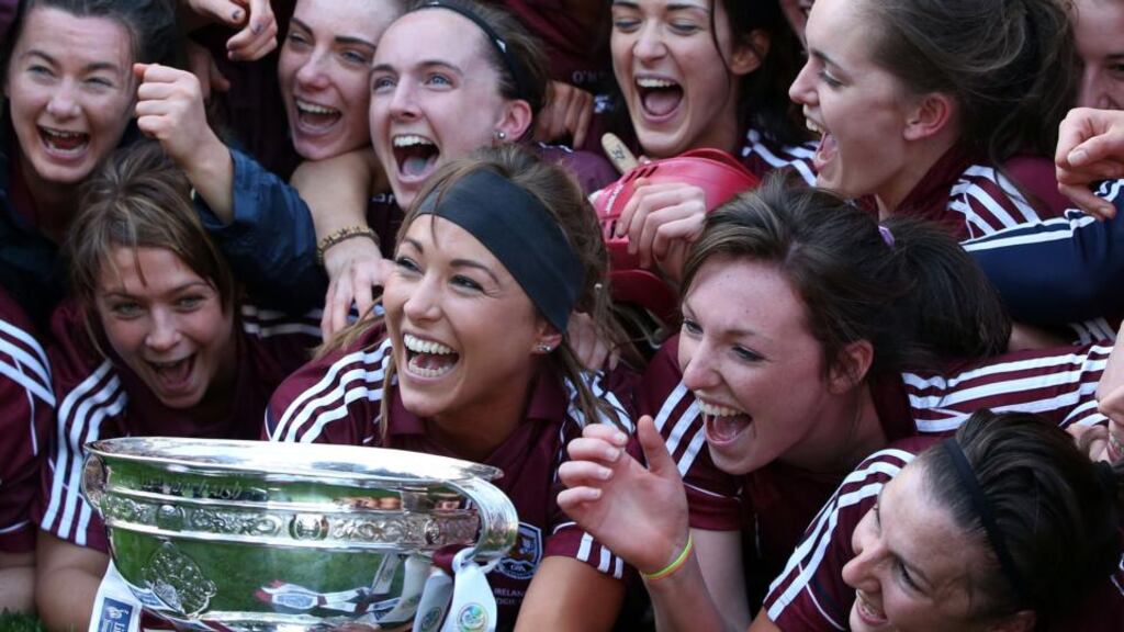 Members of the Galway team celebrate their victory over Kilkenny as they claimed the Liberty Insurance Senior Camogie Championship at Croke Park. Photograph: Dan Sheridan/Inpho