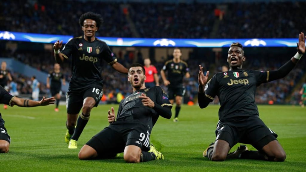 Alvaro Morata  celebrates with his Juventus team-mates after scoring their  second goal in the Champions League match against Manchester City at Etihad Stadium. Photograph: Phil Noble/Reuters/Livepic