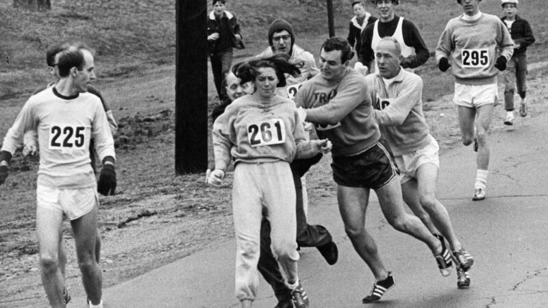 Race director Jock Semple tried to force Kathrine Switzer out of the Boston Marathon in 1967, when women were banned from running. Photograph: Paul Connell/The Boston Globe via Getty Images