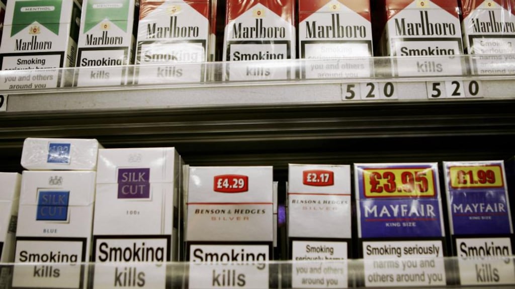 Packets of cigarettes  on display. By 2014 plain packets will be in every shop in the State. Photograph: Getty Images