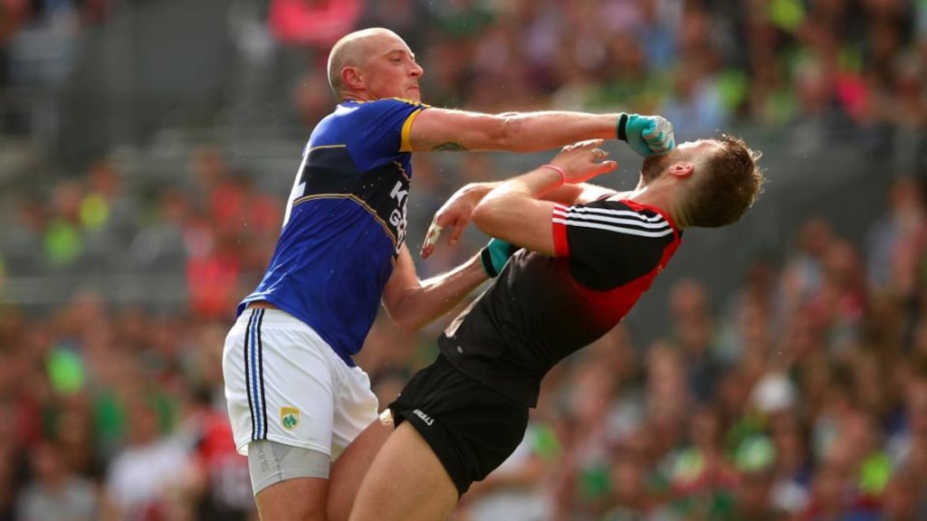 Kieran Donaghy strikes Aidan O’Shea which resulted in a red card for the Kerry full-forward. Photograph: James Crombie/Inpho