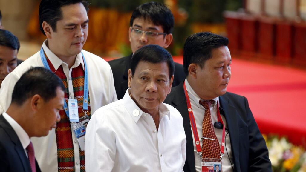 Philippine President Rodrigo Duterte (centre) Photograph: Nyein Chan Naing/EPA