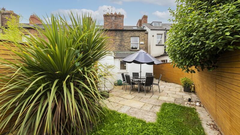Rear garden with sandstone paving