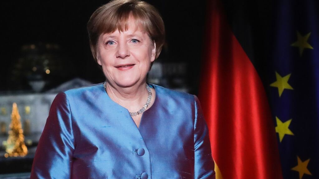 German chancellor Angela Merkel records her annual New Year’s speech at the Chancellery in Berlin on Friday. Photograph: Markus Schreiber/AFP/Getty Images