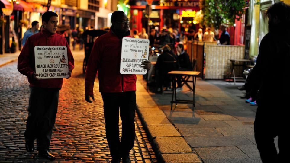 12.35am: advertising a lap-dancing club. Photograph: Aidan Crawley