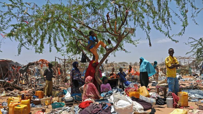Life as a refugee: a group of Somalis after soldiers destroyed their temporary shelters at a camp in Mogadishu. Photograph: Mohamed Abdiwahab/AFP/Getty