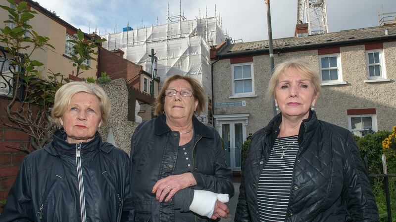 Mary Carney, Kathleen Monaghan and Rita Kane, residents of Cathedral View Court off Kevin Street, Dublin, where the view of the cathedral has been blocked by the new Maldron hotel. Photograph: Dave Meehan 03/05/2018 .Three residents of Cathedral View Court off Kevin St. in Dublin, where the view of the cathedral has been blocked by a new hotel. From left: Mary Carney, Kathleen Monaghan and Rita Kane.Photograph: Dave Meehan/The Irish Times