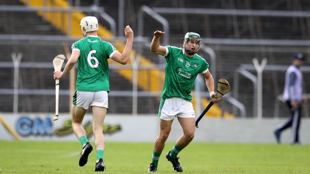 Limerick’s Kyle Hayes and Andrew La Touche Cosgrove celebrate a score. Photograph: Ryan Byrne/Inpho