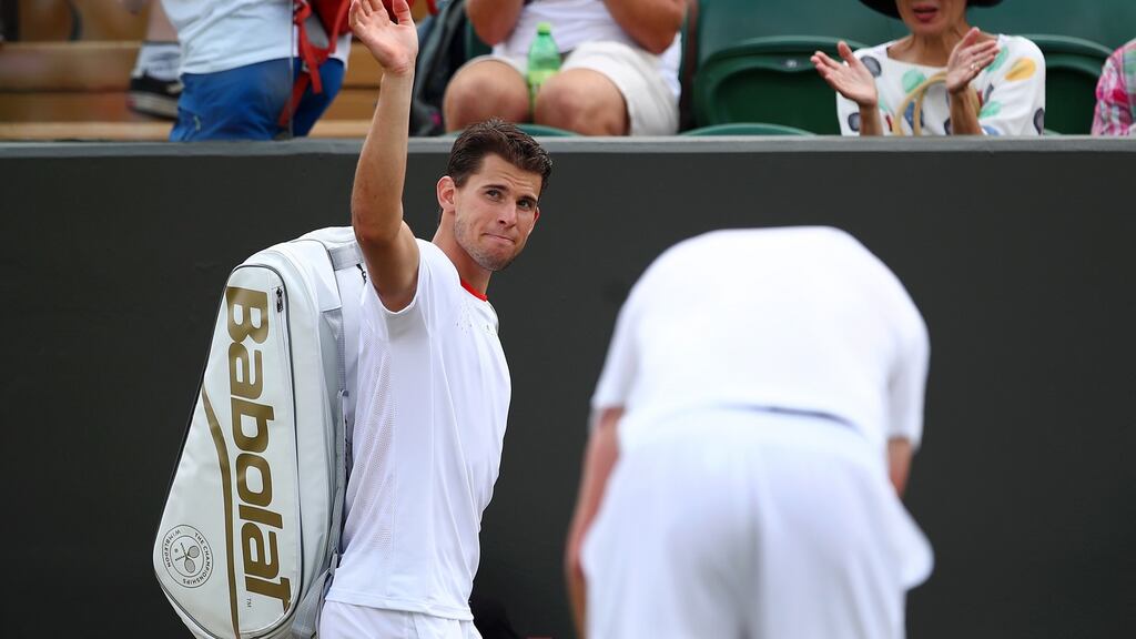Dominic Thiem of Austria waves to the crowd as he leaves the court after loosing to Sam Querrey. Photograph: Getty Images