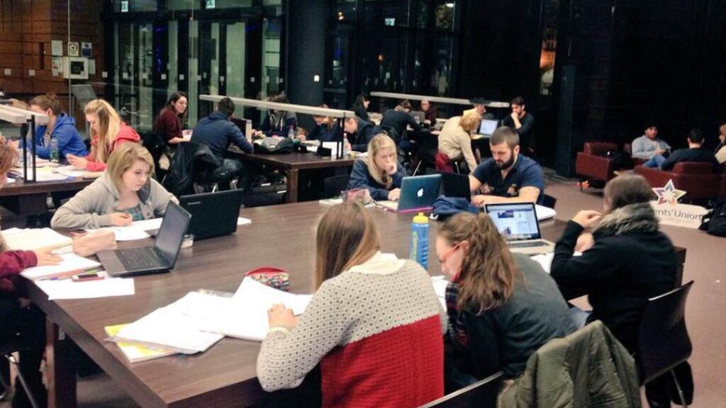 UCC students study while staging a sit-in over library opening hours. Photograph:  UCC Students Union.