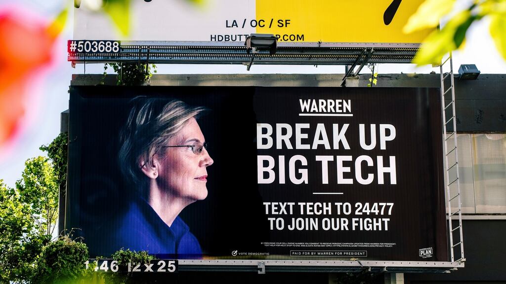 An Elizabeth Warren presidential campaign billboard. It seems like Washington DC has belatedly become alive to the undesirability of unchecked Big Tech. Photograph: Justin Kaneps/The New York Times