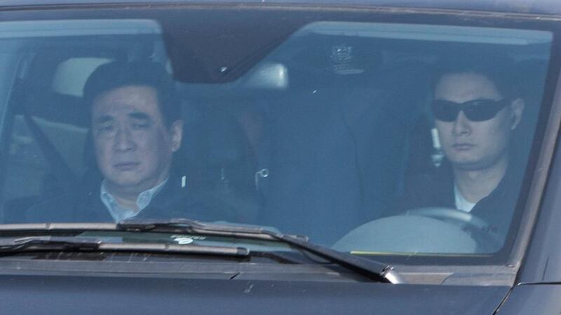 A minivan believed to be carrying ousted Chinese politician Bo Xilai leaves the Shandong Province Supreme People’s Court in Jinan, Shandong province. Photograph: Aly Song/Reuters