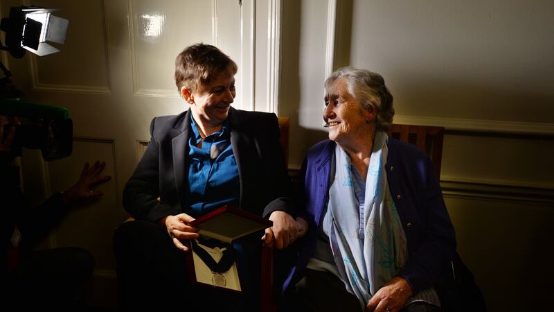 Anne Enright, at her inauguration as the first Laureate for Irish Fiction, with her mother Cora. Photograph: Alan Betson