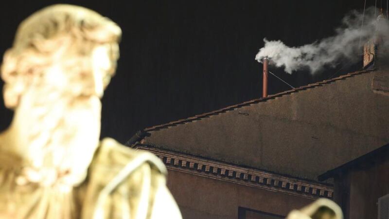 White smoke rises from the chimney above the Sistine Chapel in the Vatican, indicating a pope has been elected. Photograph: Tony Gentile/Reuters