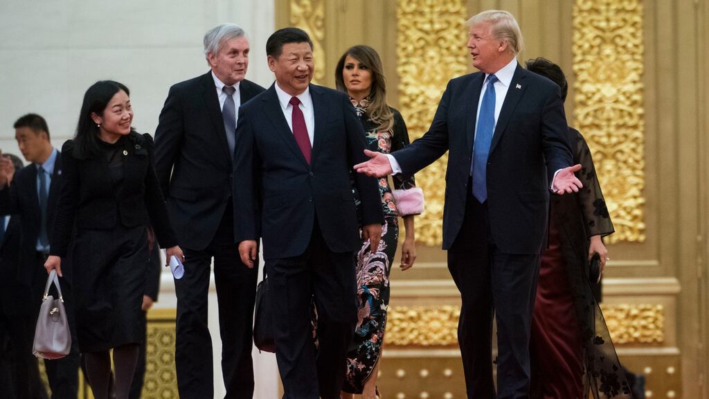 President Donald Trump and President Xi Jinping of China: investors globally were cheered by easing trade tensions between the US and China. Photograph: NYT