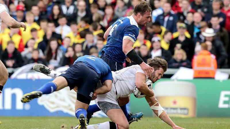 Ulster’s Stuart McCloskey is tackled by Richardt Strauss and Rhys Ruddock of Leinster during the Guinness Pro 12 game at Kingspan Stadium in Belfast. Photograph: Morgan Treacy/Inpho
