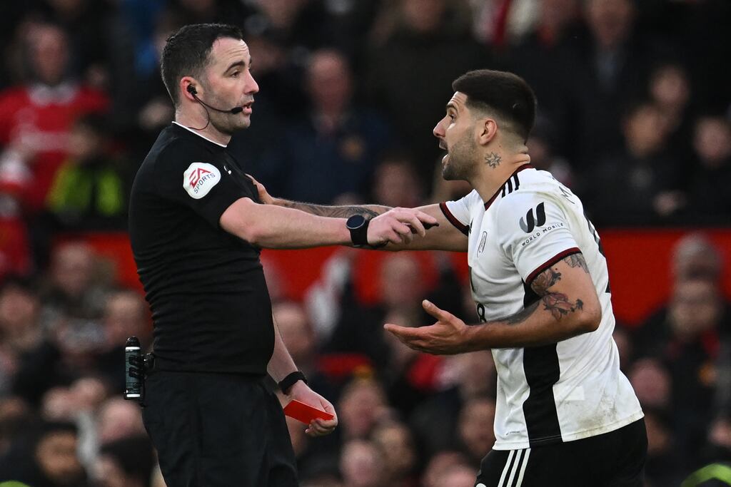 Fulham's Aleksandar Mitrovic argues with referee Chris Kavanagh and gets himself sent off during the FA Cup quarter-final against Manchester United a Old Trafford. Photograph: Paul Ellis/AFP via Getty Images