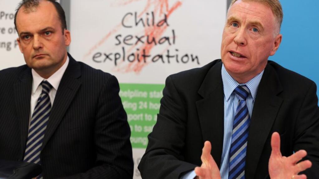 Police Service of Northern Ireland (PSNI) Detective Superintendent Sean Wright (left) and Tony Rodgers, Assistant Director of Social Services, Child Care, speaking at a press briefing on child sex abuse in Belfast today. Photograph: Paul Faith/PA Wire