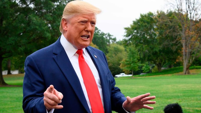 US president Donald Trump railed against the ‘do-nothing Democrats’ impeachment on Sunday on Twitter with a string of retweets from supporters. Photograph: Jim Watson/AFP via Getty