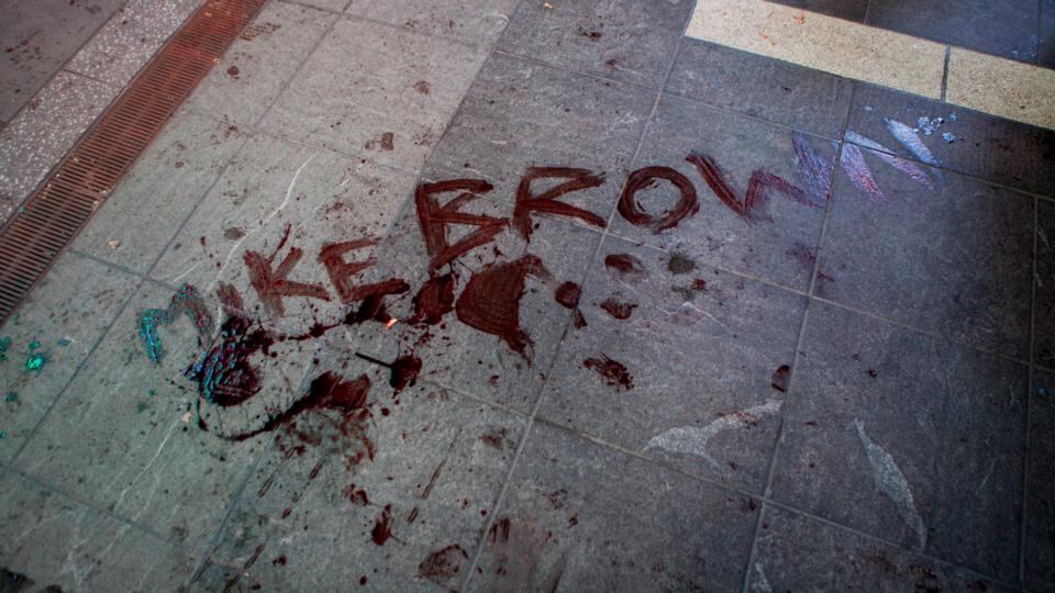Mike Brown’s name scrawled on the ground in Times Square in New York during a demonstration in reaction to the St Louis County grand jury decision not to indict Ferguson police officer Darren Wilson. The New York Times/