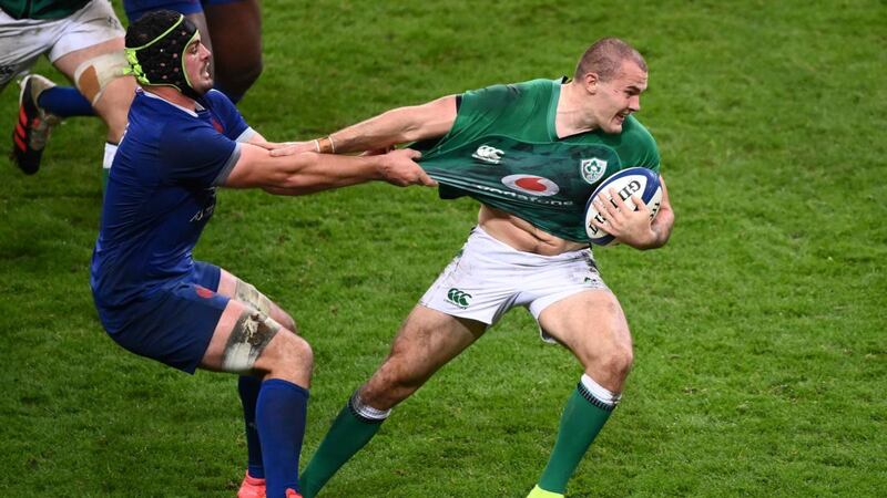 Ireland’s fullback Jacob Stockdale  is tackled by French number eight Gregory Alldritt during the Six Nations  match  at the Stade de France. Photograph: Franck Fife/AFP via Getty Images