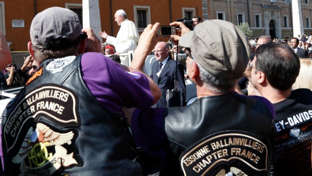Pope Francis blesses the Harley-Davidson bikers from his Popemobile before the start of a mass outside Saint Peter’s Square in Rome yesterday. Photograph: Reuters/Stefano Rellandini