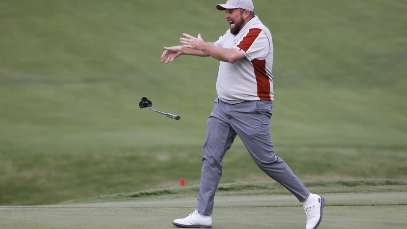 Lowry celebrates his winning putt. Photo: Erik S. Lesser/EPA