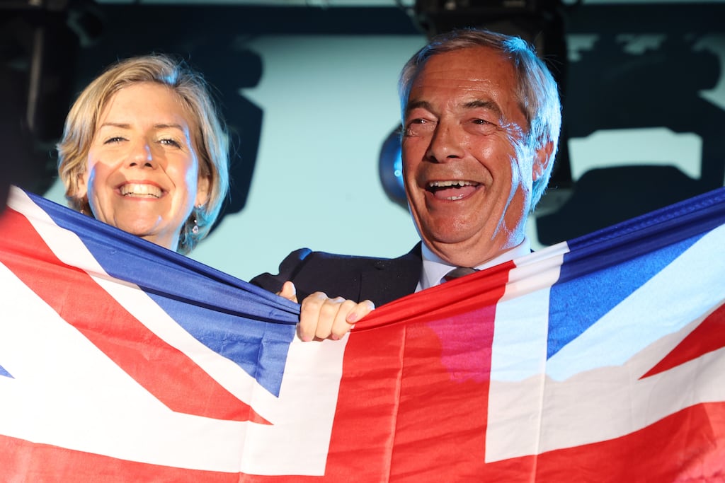 Andrea Jenkyns of Reform UK and the party's leader Nigel Farage celebrate victory in England's local elections. Photograph: Lia Toby/Getty Images