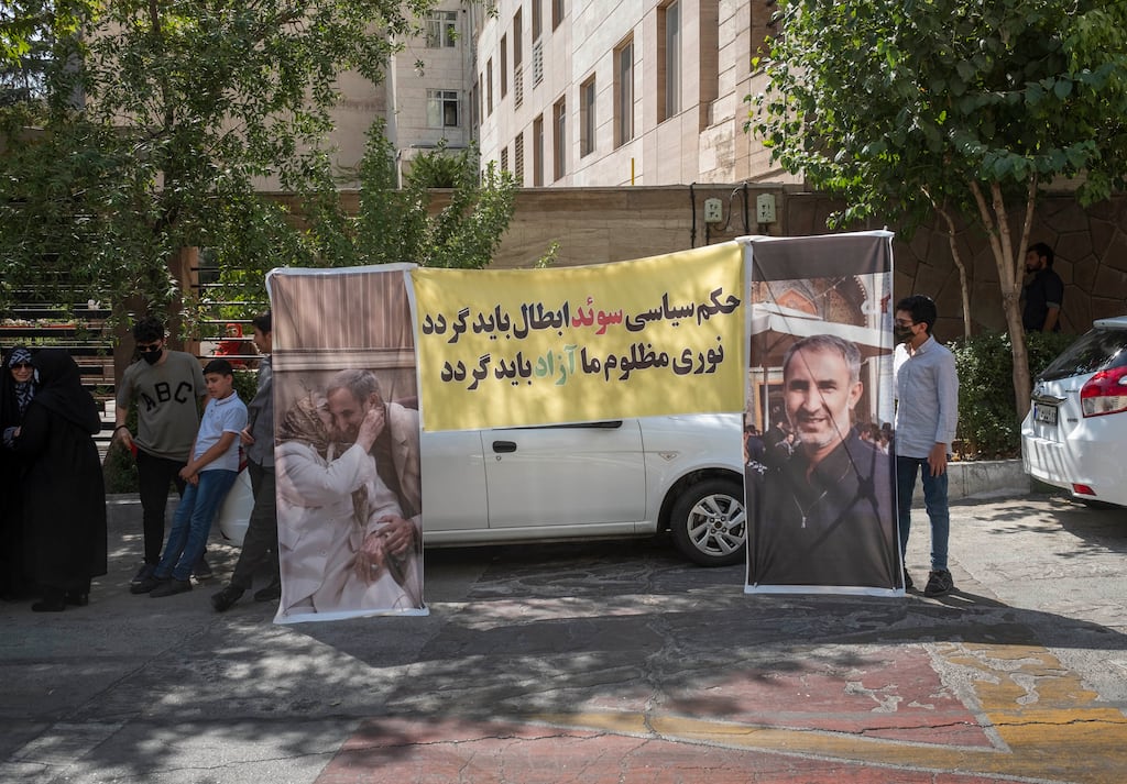 Iranian protesters hold portraits of Hamid Nouri and call for him to be freed, during a protest gathering in front of the Swedish embassy in northern Tehran on July 19th. Nouri was sentenced to life imprisonment by a Swedish court on July 14th. Photograph: Morteza Nikoubazl/NurPhoto via Getty Images