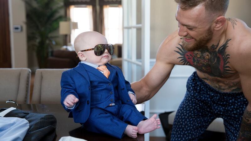 McGregor with his son Conor Jack McGregor during a suit fitting with David August Heil in Vegas. Photo: Emily WIlson/The New York Times