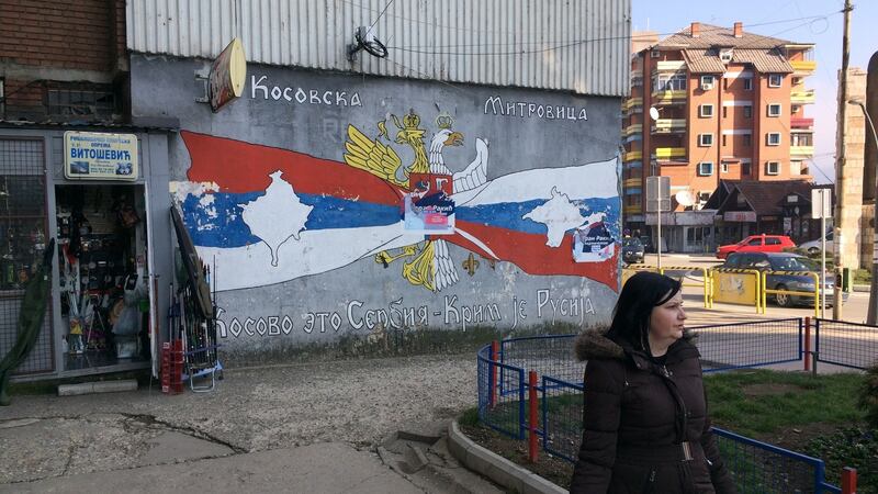 Graffiti in the mostly Serb half of the city of Mitrovica in Kosovo, saying: “Kosovo is Serbia, Crimea is Russia”. Photograph: Dan McLaughlin