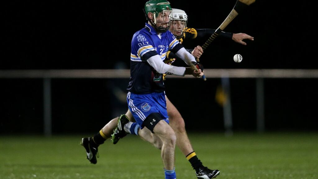 Kilkenny’s Michael Kenny and John Henderson of DIT in action during the Walsh Cup match in Dunmore. Photograph: Cathal Noonan/Inpho