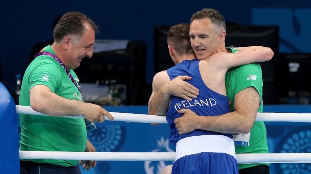 Ireland’s Brendan Irvine celebrates with boxing coach Billy Walsh. Photo: Ryan Byrne/Inpho