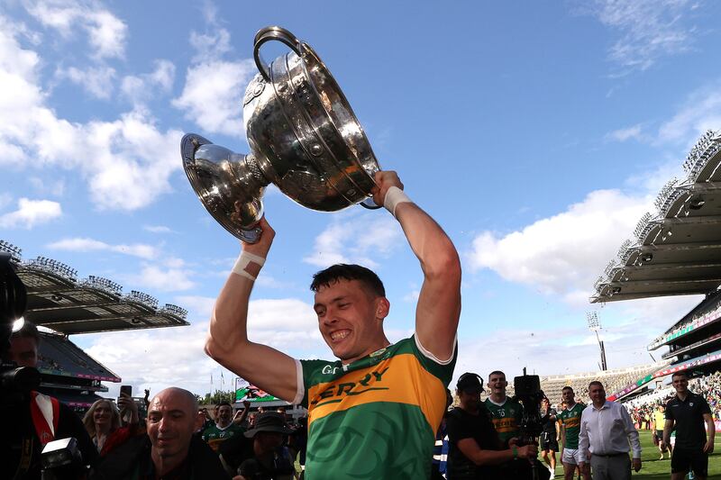 Kerry’s David Clifford celebrates with the Sam Maguire Cup. Photograph: Bryan Keane/Inpho