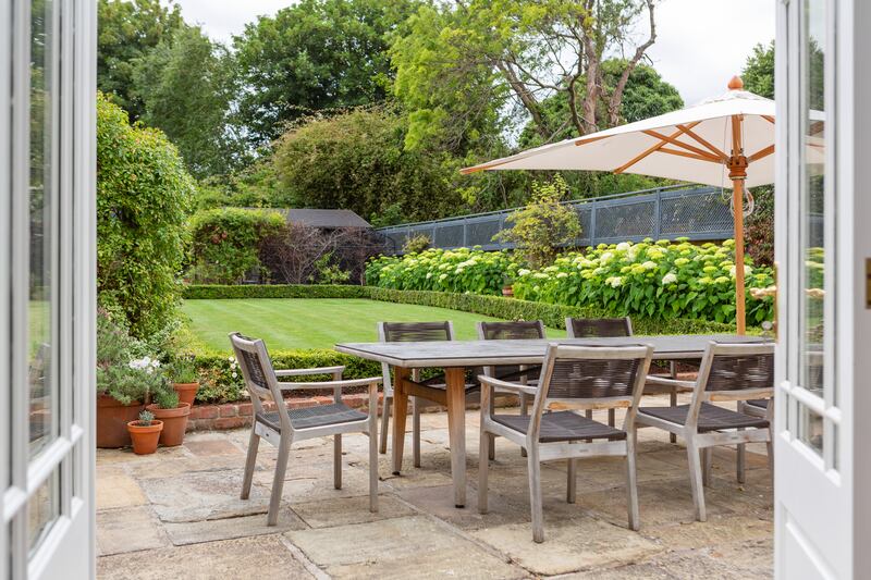 A dining area lies off the conservatory
